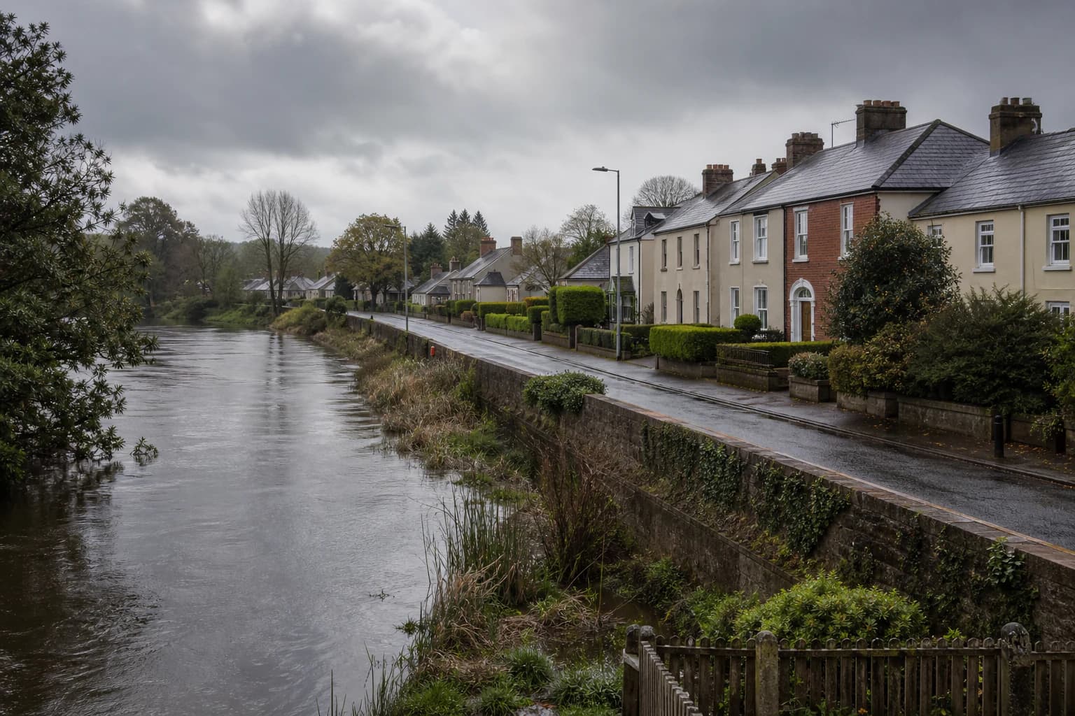 Illustrative Irish riverside homes within a mapped flood extent